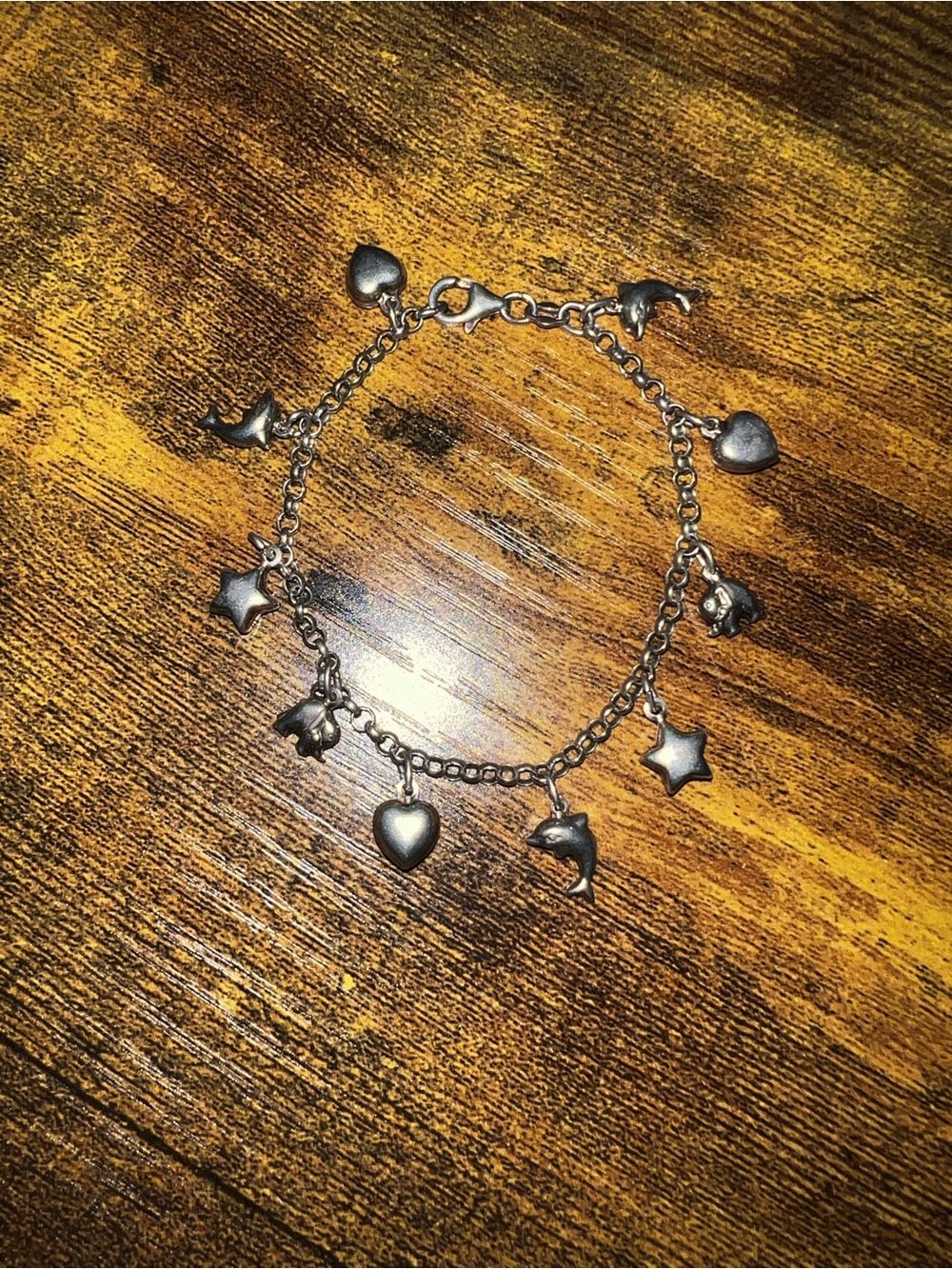 Silver-Tone Charm Bracelet with Hearts, Stars, and Dolphins